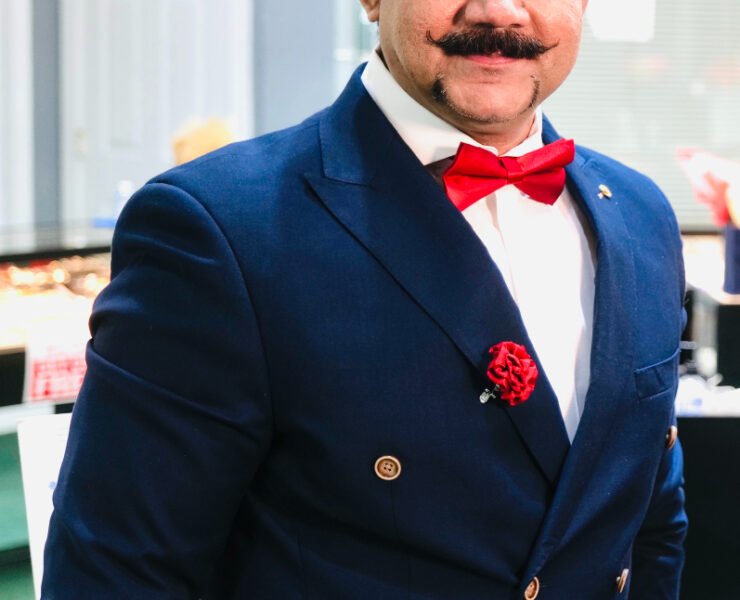 Tauqeer Imran, owner of Ron Jewelers in New Orleans, posing for his interview with Inside New Orleans magazine