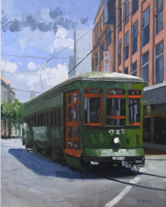 Painting of a streetcar by Jacques Soulas used as the cover for Inside New Orleans Magazine